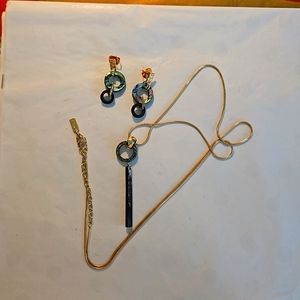 AKOLA matched earrings and necklace. Mother of pearl and gold.